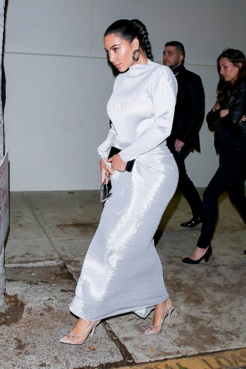 Los Angeles, CA  - Kim Kardashian looks like a vision in white as she leaves the Midnight Sunday Ser