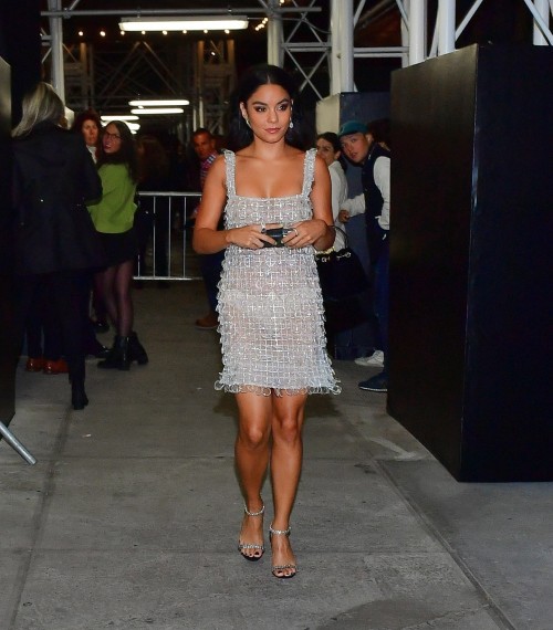 New York, NY  - Actress, Vanessa Hudgens is all smiles as she dons a silver mini dress while leaving