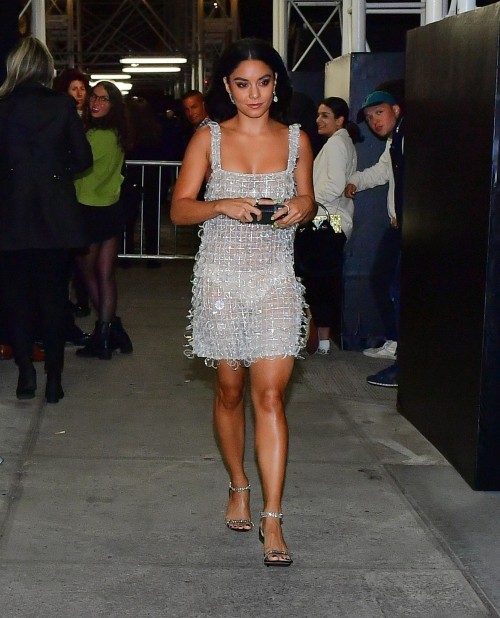 New York, NY  - Actress, Vanessa Hudgens is all smiles as she dons a silver mini dress while leaving
