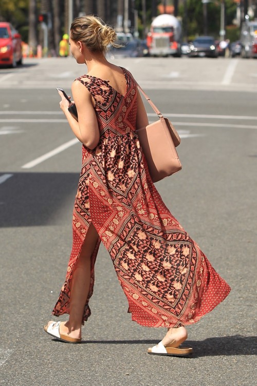 AG_175343 -  - Beverly Hills, CA - Aly Michalka looks pretty in a flowing, long dress as she runs a 