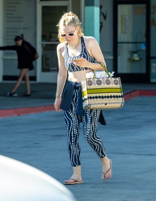 Los Angeles, CA  - *EXCLUSIVE*  - Dakota Fanning looking very sweaty and red faced after an exercise