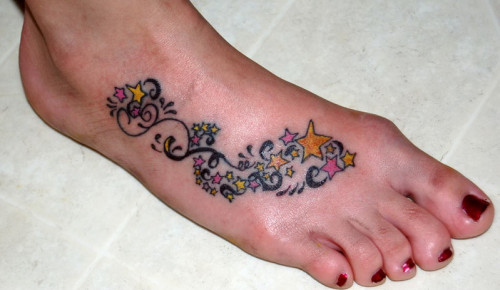 awesorm colored stars tattoos on girl right foot