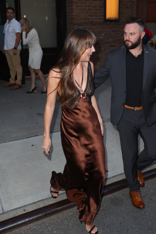 New York City, NY  - Dakota Johnson turns heads while stepping out of the Greenwich Hotel in New Yor
